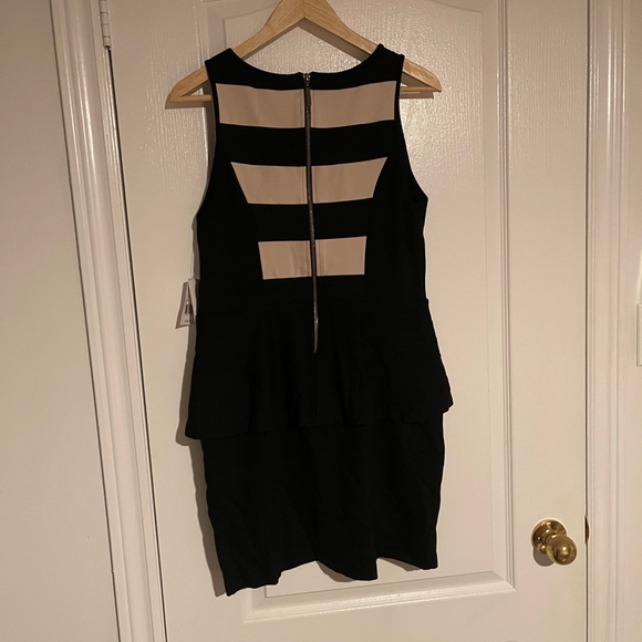 Kenzie never worn peplum body con dress - Picture 4 of 5